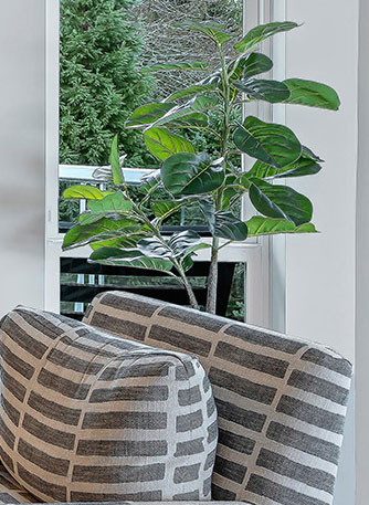 living room grey and white cushions on chair